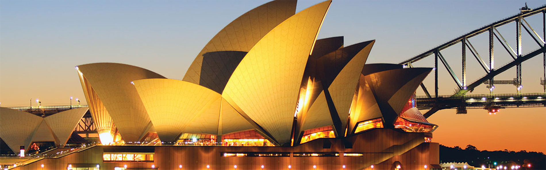 alaska blue lake with mountains and greenery, things you'll see on an alaska cruise