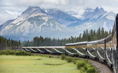 The Rocky Mountaineer travelling through the Canadian Rockies, a popular rail extension to Canada cruises
