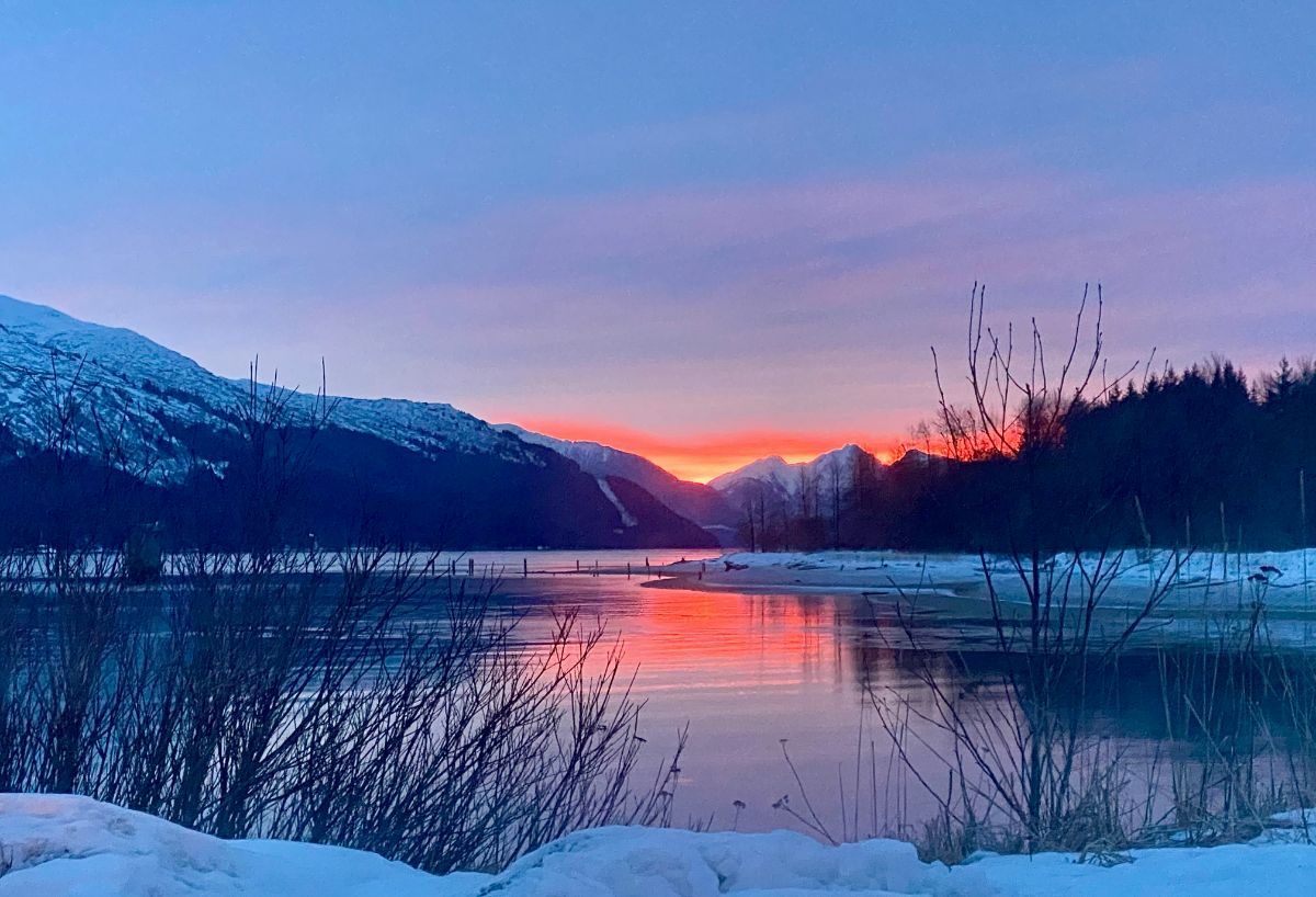 alaska at night, a sunset across the mountains and lakes